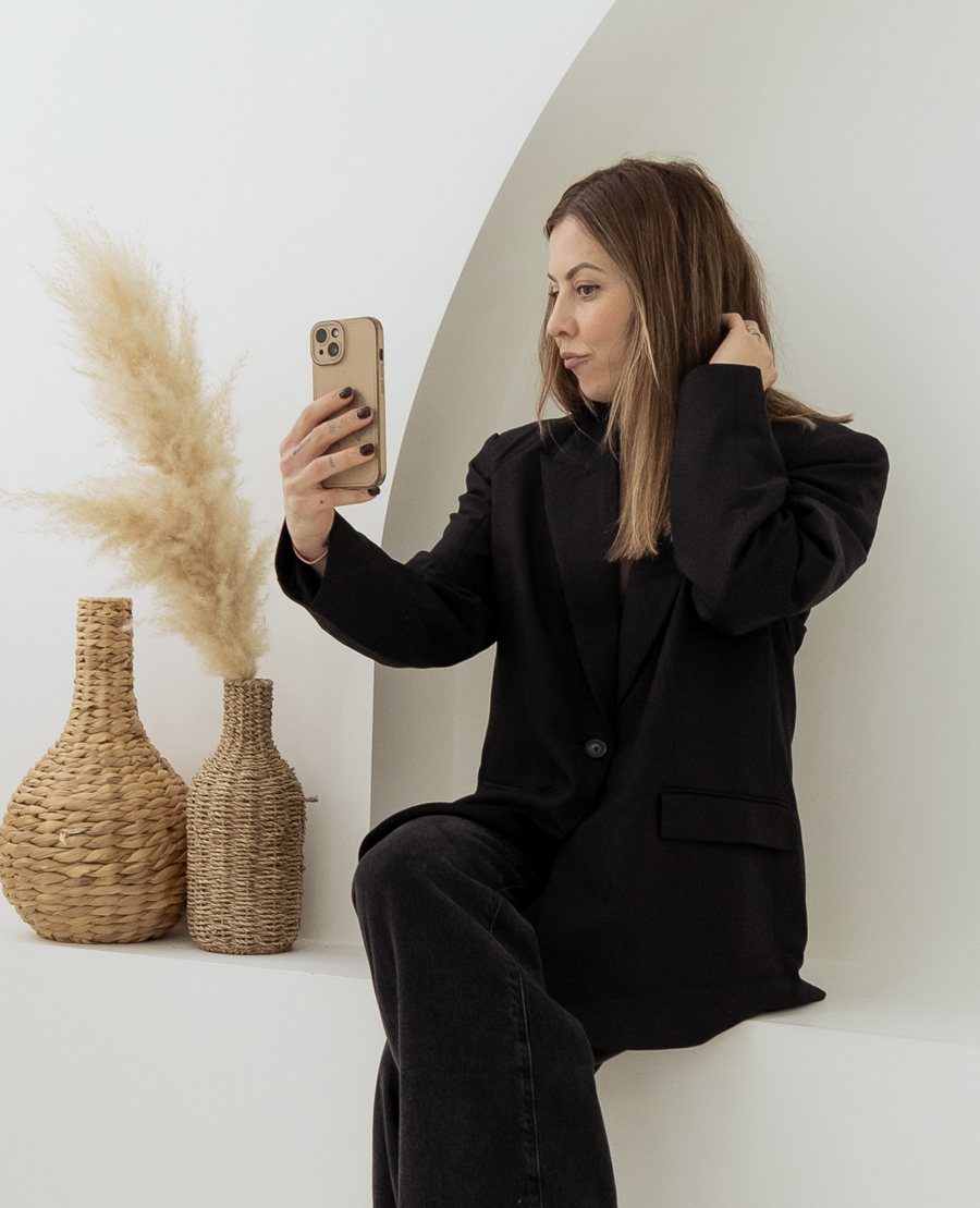 Adele Molyneux on her phone